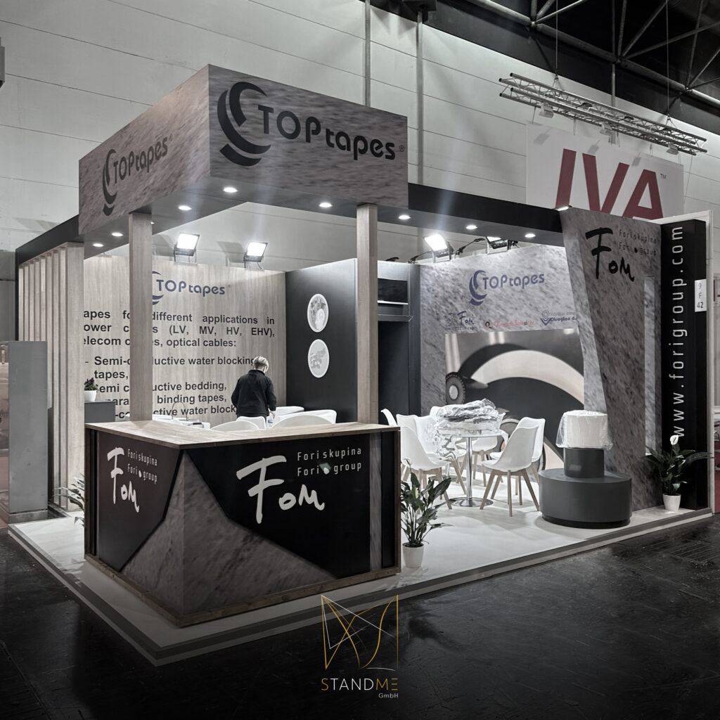 Custom exhibition stand design by StandMe showcasing creativity and client focus in event marketing solutions.